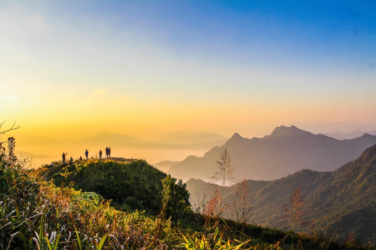Services Photo Of People Standing On Top Of Mountain Near Grasses 733162